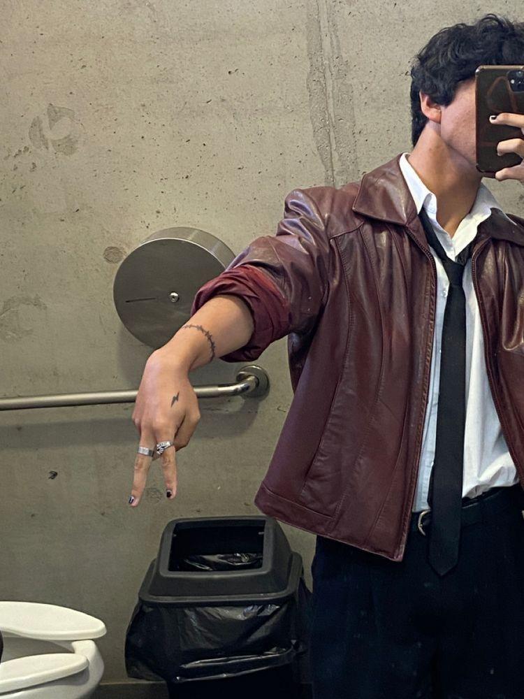 Oxblood leather with white shirt and thin tie