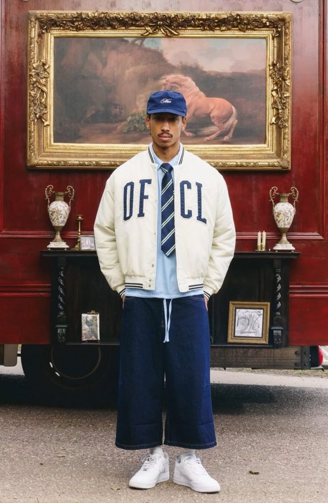 Varsity jacket, tie, wide denim